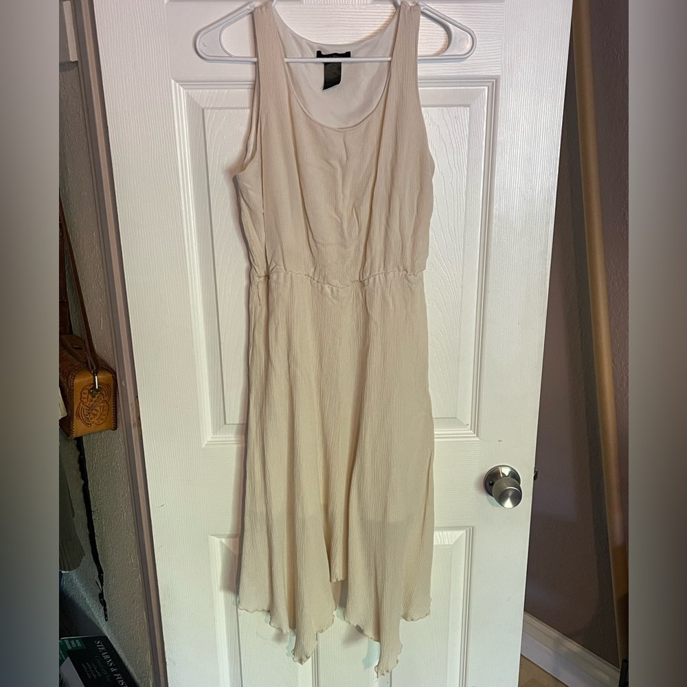 Whimsical cream ruffle dress